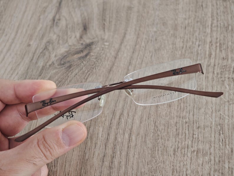 Ray-Ban RB8583 glasögonbågar utan bågar i titan – metallic brun – NOS bild 3