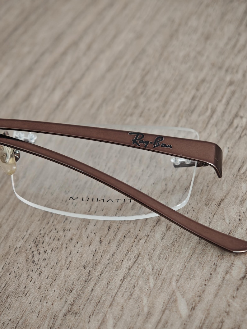 Ray-Ban RB8583 glasögonbågar utan bågar i titan – metallic brun – NOS bild 10