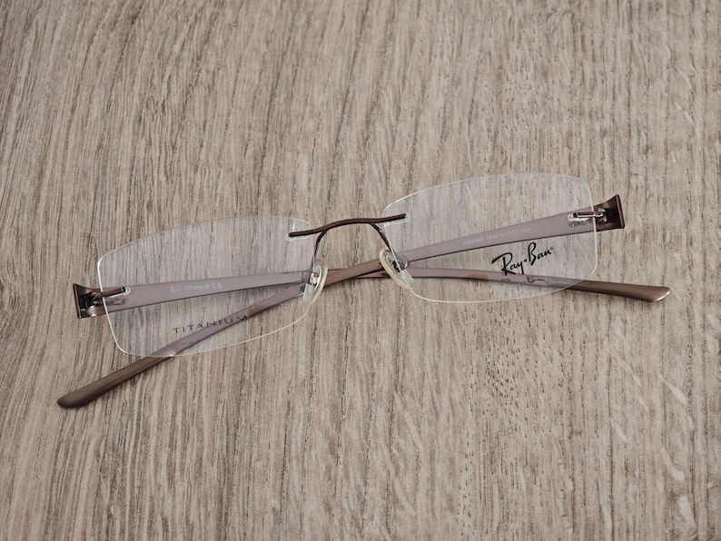 Ray-Ban RB8583 glasögonbågar utan bågar i titan – metallic brun – NOS bild 1