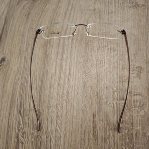Ray-Ban RB8583 glasögonbågar utan bågar i titan – metallic brun – NOS bild 11