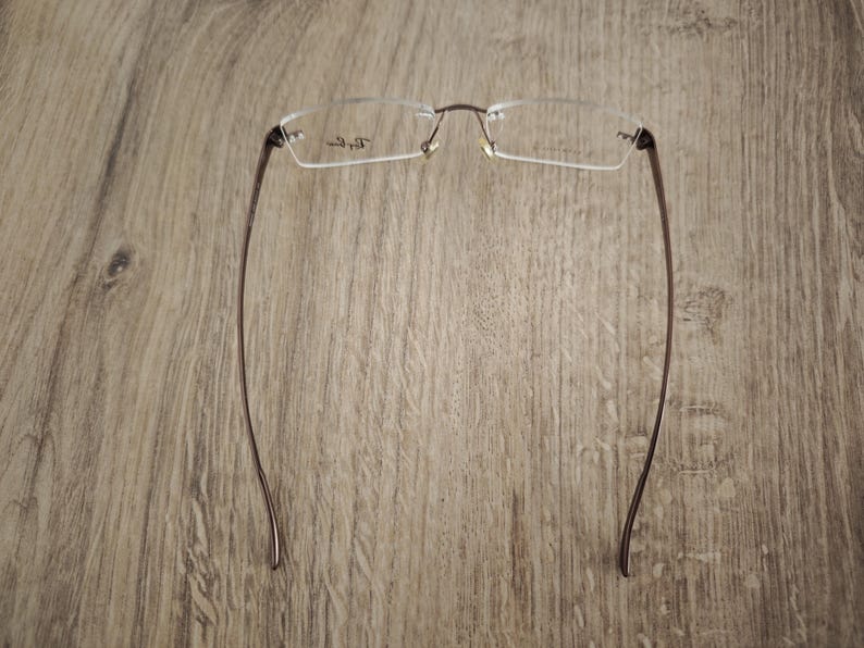 Ray-Ban RB8583 glasögonbågar utan bågar i titan – metallic brun – NOS bild 11
