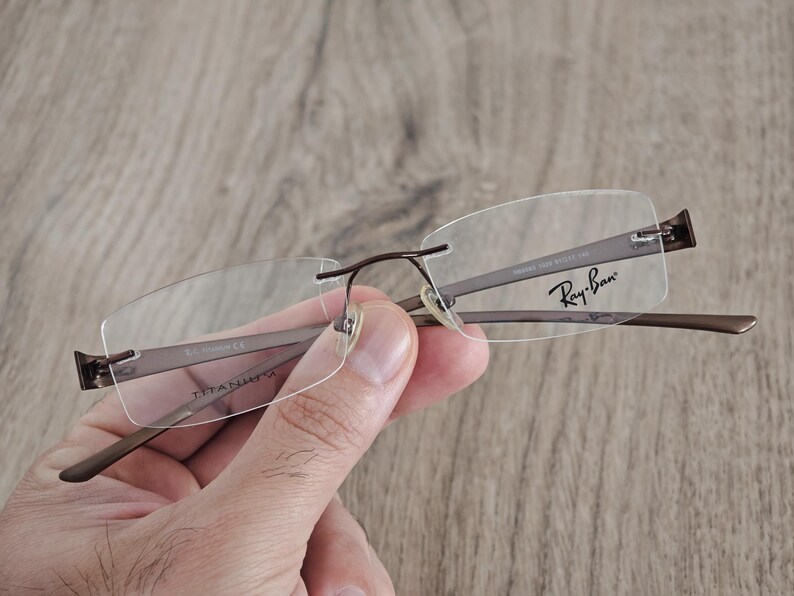 Ray-Ban RB8583 glasögonbågar utan bågar i titan – metallic brun – NOS bild 2