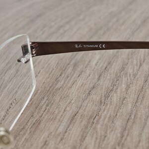 Ray-Ban RB8583 glasögonbågar utan bågar i titan – metallic brun – NOS bild 8