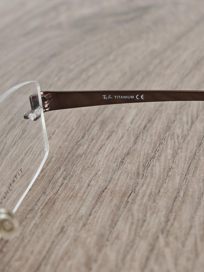 Ray-Ban RB8583 glasögonbågar utan bågar i titan – metallic brun – NOS bild 8