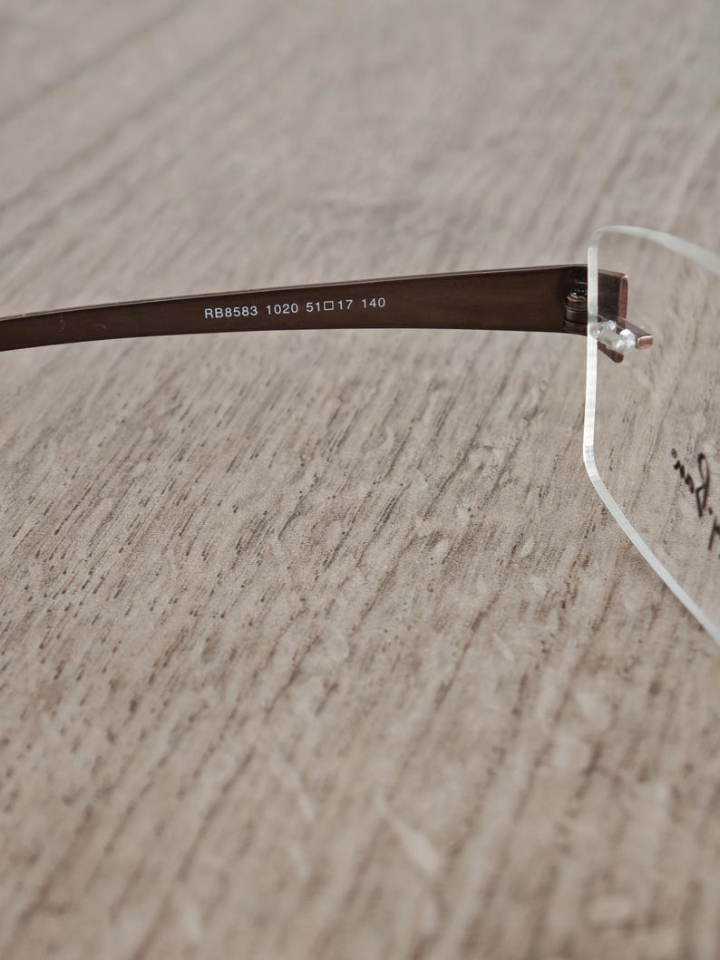 Ray-Ban RB8583 glasögonbågar utan bågar i titan – metallic brun – NOS bild 9