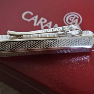 May include: A rustic wooden sign with the text "Welcome to our home" in white lettering. The sign features a distressed finish and a simple, inviting design, perfect for a front porch or entryway.