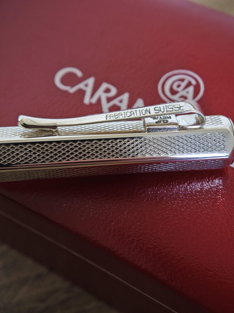 May include: A rustic wooden sign with the text "Welcome to our home" in white lettering. The sign features a distressed finish and a simple, inviting design, perfect for a front porch or entryway.