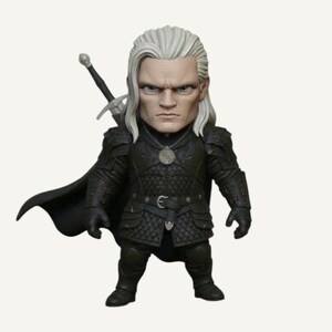 May include: A figurine of a character with white hair, a stern expression, and black armour. The figure has a sword on its back and a black cape. The figurine is standing on a white background.