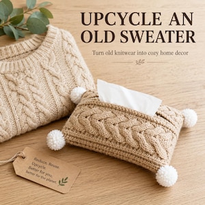 May include: A beige cable-knit tissue box cover with four white pom-poms at the corners, accompanied by a matching sweater and a brown paper tag printed with the text: Reduce. Reuse. Upcycle. Better for you, better for the planet.