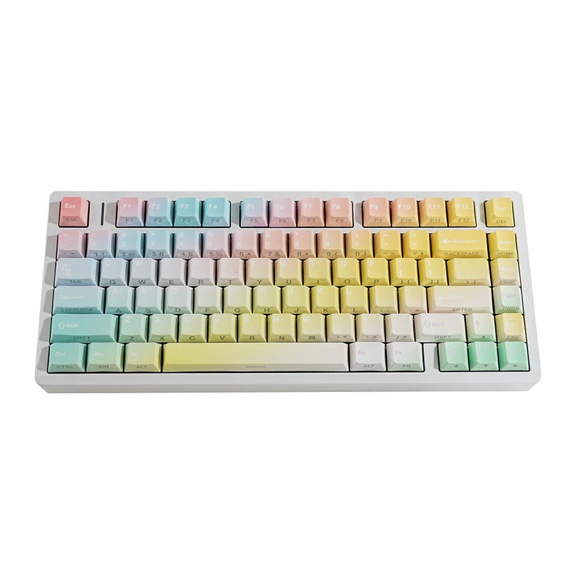 May include: A white mechanical keyboard with gradient-colored keycaps. The keycaps transition from pink to blue, then to yellow and green. The keyboard has a standard QWERTY layout.