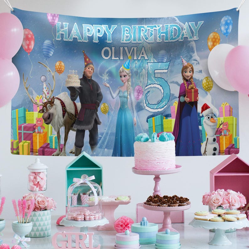 May include: A birthday party scene with a banner that reads "Happy Birthday Olivia 5". The banner features characters from the movie Frozen, balloons, and gift boxes. The table is decorated with cakes, sweets, and pink and blue decorations.