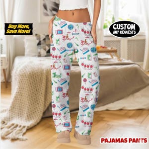 May include: White pajama pants with a colorful pattern of various Asian-themed illustrations. The pants have a comfortable, loose fit and feature the text "PAJAMAS PANTS". The image also includes the text "Buy More, Save More!" and "CUSTOM ANY REQUESTS".