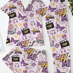May include: A light pink pajama set featuring a repeating pattern of butterflies, musical notes, microphones, guitars, and the text "Hannah Montana". The set includes a short-sleeved top, shorts, and pants.