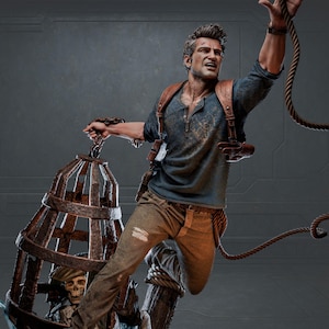 May include: A detailed statue of a man in action, wearing a blue shirt, brown pants, and a leather harness. He's holding a cage with a skeleton inside and a rope, with a determined expression. The statue has a realistic, action-oriented design.