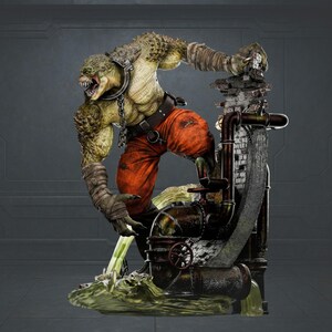 May include: A detailed statue of a reptilian humanoid creature with green and tan skin, wearing orange pants and a metal collar. The figure is posed on a structure with pipes and brickwork, with a green liquid at its base.