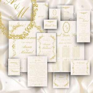 May include: A selection of wedding stationery in cream with gold detailing. The set includes invitations, menu cards, table cards, and thank you notes. The design features ornate floral borders and the names "Anna & Michael".