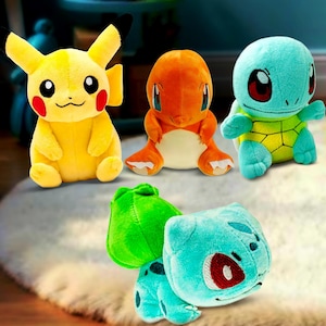 May include: A collection of five plush toys featuring popular characters. The toys include a yellow Pikachu, an orange Charmander, a blue Squirtle, and two green and blue Bulbasaur plushies. Each toy has detailed facial features and is made of soft fabric.