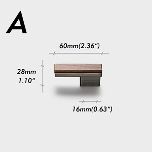 May include: A cabinet pull with a rectangular wooden top and a metal base. The pull is 60mm (2.36") long, 28mm (1.10") high, and 16mm (0.63") wide. The letter "A" is in the upper left corner.
