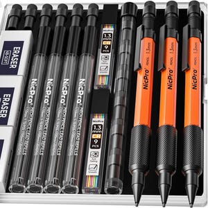 May include: A set of mechanical pencils, lead refills, and erasers. The pencils are black and orange, labeled "NicPro 1.3mm". The lead refills are labeled "NicPro 1.3 mm CR 9 PCS". The erasers are white with black text. The set is in a clear plastic case.