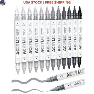 May include: A set of twelve dual-tip acrylic markers arranged in a gradient from white to black. Each marker features a brush tip on one end and a chisel tip on the other, with the text ACRYLIC MARKER DUAL TIP printed clearly on the white barrel.