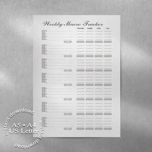May include: A printable weekly macro tracker on white paper. The tracker includes sections for protein, carbs, fats, and calories, with space for daily and total entries. The text "Weekly Macro Tracker" is at the top. The paper is available in A5, A4, and US Letter sizes.