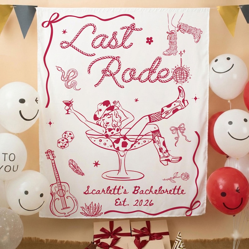 May include: White fabric banner with a red illustration of a woman in a cocktail glass, cowboy boots, and the text "Last & Rode". Includes dice, a guitar, and the text "Scarlett's Bachelorette Est. 2026". Balloons with smiley faces and red balloons are in the background.