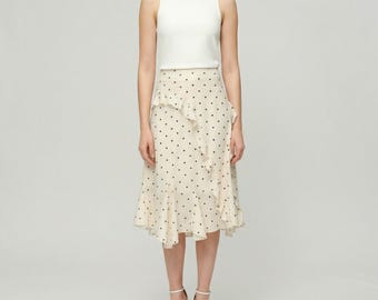 Falda midi de lunares - Talle alto, volantes, corte entallado y vuelo