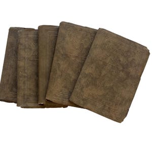 May include: A set of five antique brown books from The Nutshell Library series by Sherman Cody. Each book features a textured cover with embossed rectangular border lines and the author's name printed on the front in a simple, dark font.