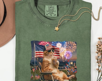 Comfort Colors®    Patriotic Cat T-Shirt, Fourth of July Cat Tee, American Flag Cat Graphic, Fireworks Kitty T-Shirt