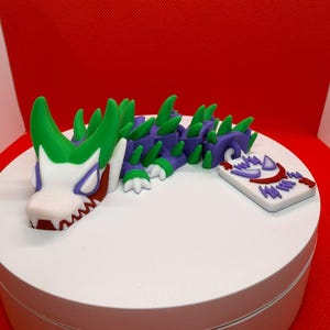 The movable Joker dragon toy is made on a 3D printer