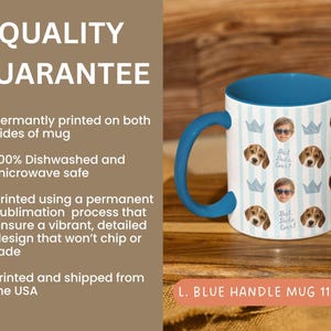 White ceramic mug with a blue handle and interior. The mug features a pattern of baby faces, blue crowns, and the text "Best Daddy Ever" on a light blue striped background.