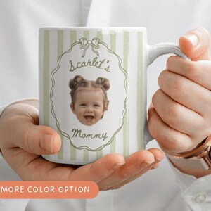 Personalized coffee mug with sage green vertical stripes, displaying a baby portrait with coquette frame, custom keepsake gift for Mom, Dad, Grandma and Grandpa