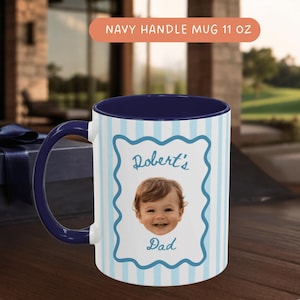 Personalized coffee mug with light blue scalloped frame and navy blue handle, featuring a smiling baby portrait, custom Grandpa, Papa and Dad gift