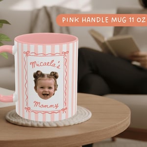 Personalized coffee mug with blush pink vertical stripes and pink handle, featuring a cute baby portrait, custom keepsake gift for Mom, Grandma and Nana