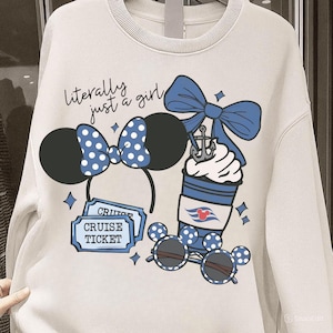 May include: White sweatshirt with a graphic design featuring a Minnie Mouse ear headband, sunglasses, and a coffee cup with a bow. The text "literally just a girl" is above the design. The design includes blue polka dots and cruise ticket.