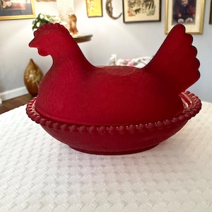 May include: A set of three ceramic mugs with a speckled, matte finish. The mugs are in shades of cream, light gray, and dark gray. Each mug has a simple, minimalist design and a rounded handle. Perfect for coffee or tea.