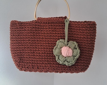 Terracotta bag with gold-colored handles