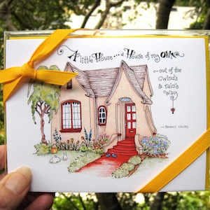 May include: A yellow card with a hand-drawn illustration of a small house with a red door and a red walkway. The text on the card reads "A little House... a House of my Own ~ out of the Wind's & Rain's Way" and is signed "Padraic Colum".