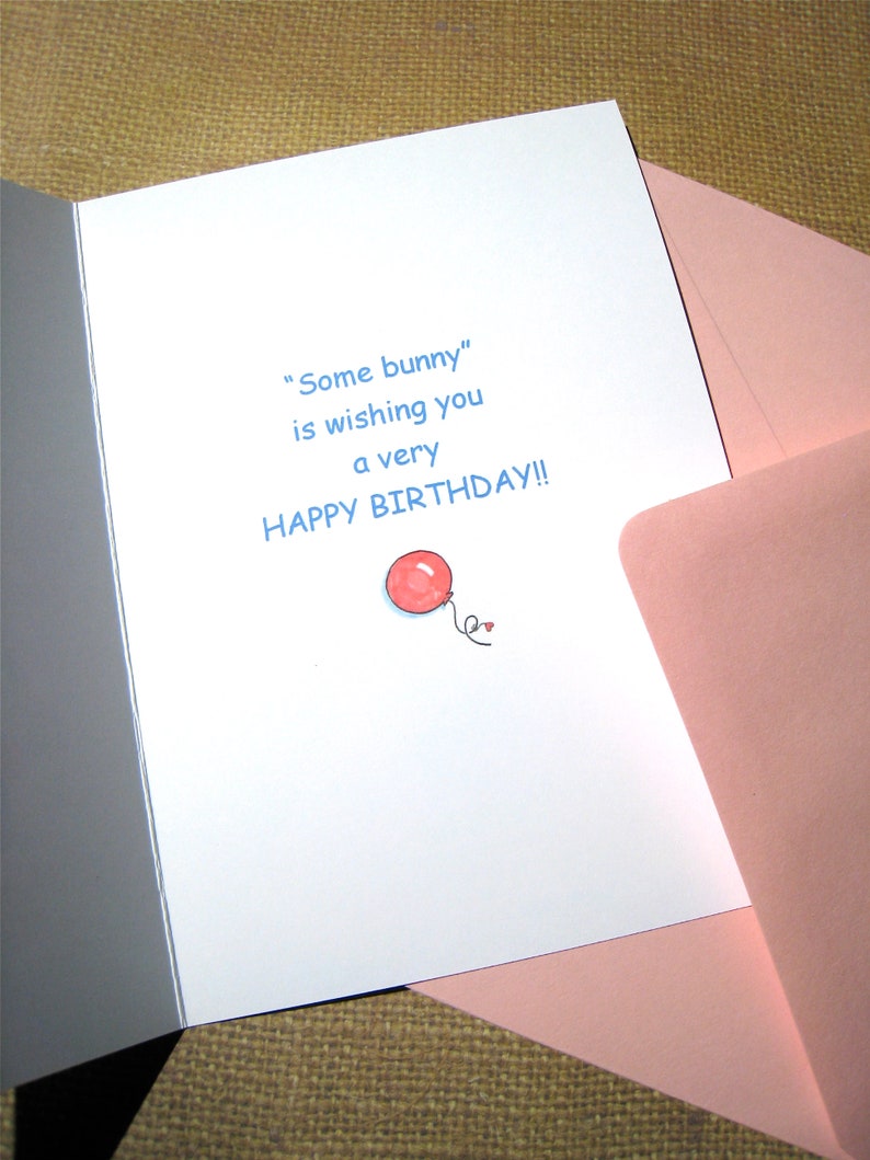 May include: A white card with blue text that reads "Some bunny" is wishing you a very happy birthday! A red balloon with a string is drawn in the bottom right corner.