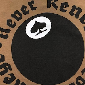 Detailed close-up of circular back embroidery text and logo