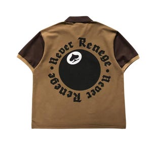 Back view of brown polo shirt with large circular embroidered design