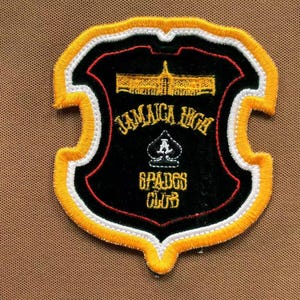 Close-up of embroidered crest patch on chest