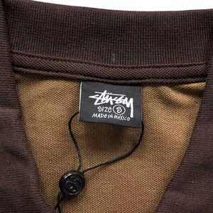 Close-up of inner neck label and stitching detail