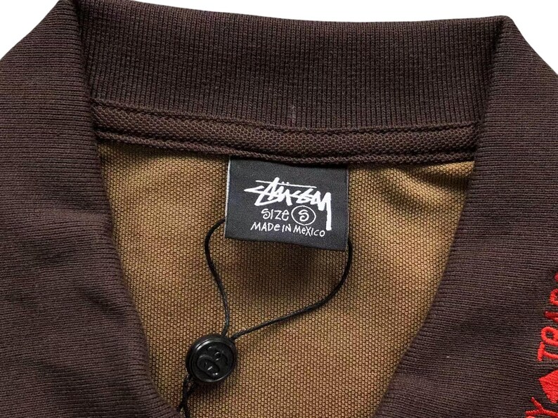 Close-up of inner neck label and stitching detail