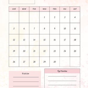 Op de afbeelding: Een roze en witte april 2026 kalender met een aquarel ontwerp. De kalender bevat een to-do lijst en een sectie met topprioriteiten. De maandnaam is in een scriptlettertype.