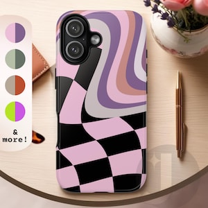 May include: A phone case with a retro design. The case features a pink and black checkerboard pattern on the bottom half, and a wavy design in shades of purple, pink, and beige on the top half. The case has a black camera cutout and the text "& more!" on the side.