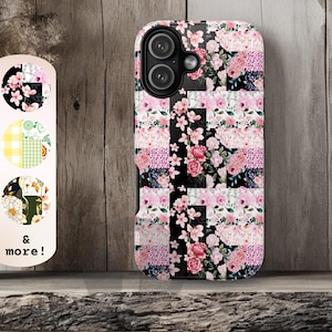 May include: A floral phone case with a patchwork design. The case features pink roses, white flowers, and black accents. The design includes the text "& more!" on the left side.