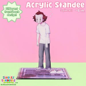 Könnte beinhalten: Acryl-Standee mit einer Comicfigur im Pyjama, ca. 15 cm groß. Die Figur hat ein weißes Gesicht mit schwarzen Linien und rotem Haar. Der Standee enthält einen Teppich und Häschen-Hausschuhe. Text auf dem Bild: "Acrylic Standee" und "Jingles Funhouse".