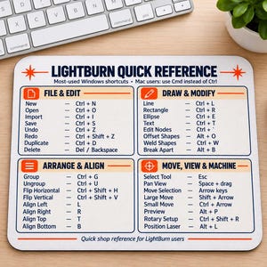 May include: A white rectangular mouse pad featuring a LightBurn Quick Reference guide with black text and orange accents. The grid displays keyboard shortcuts for File & Edit, Draw & Modify, Arrange & Align, and Move, View & Machine functions.
