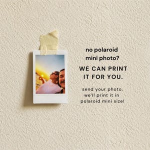May include: A white-bordered mini instant photo featuring a sunset scene with two people, attached to a textured wall with beige tape. The text reads: no polaroid mini photo? WE CAN PRINT IT FOR YOU. send your photo, we'll print it in polaroid mini size!